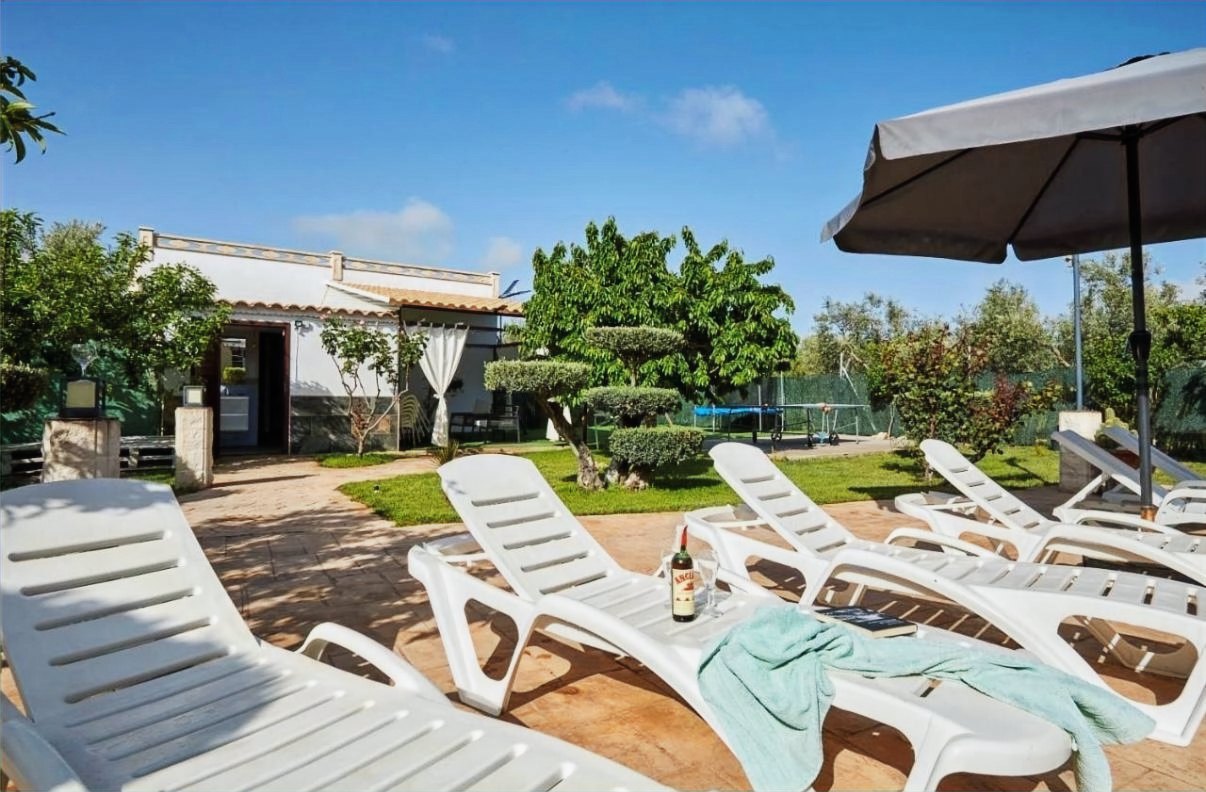 Solárium y jardín de Villa Vega